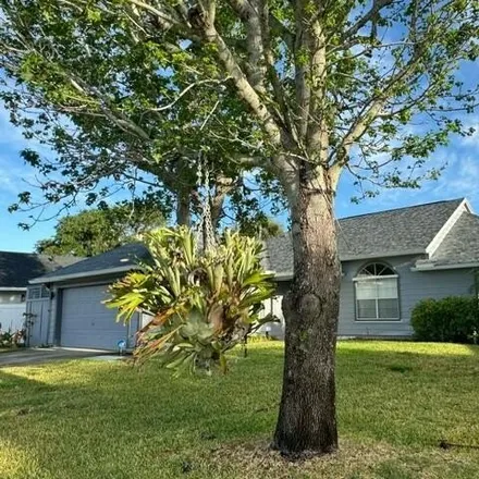 Rent this 3 bed house on 1348 Heritage Acres Boulevard in Rockledge, FL 32955