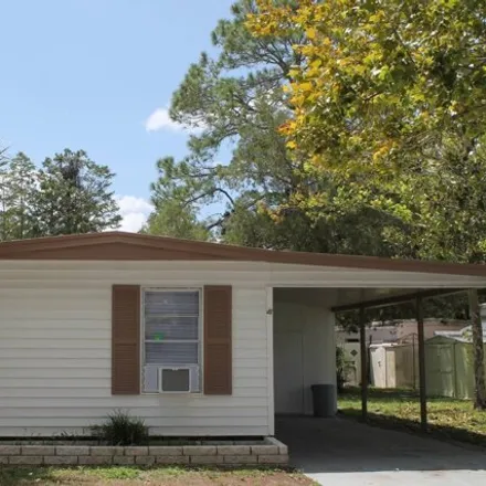 Buy this studio apartment on 6471 Sun Country Drive in Pasco County, FL 34653