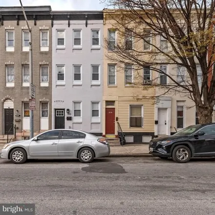 Buy this 5 bed house on 1110 North Fulton Avenue in Baltimore, MD 21217