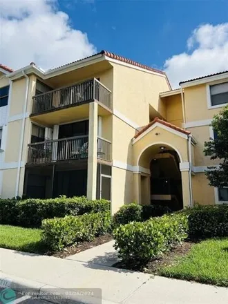 Rent this 2 bed condo on 5725 Riverside Drive in Pine Ridge Villas, Coral Springs