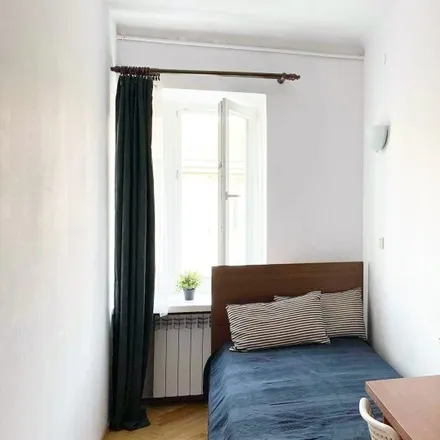 Rent this 5 bed room on Romualda Traugutta in 00-066 Warsaw, Poland