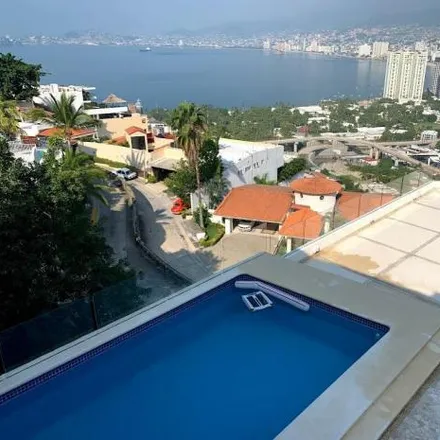 Buy this 3 bed house on Vista de la Marea in Zona Federal Base Naval Icacos, 39300 Acapulco