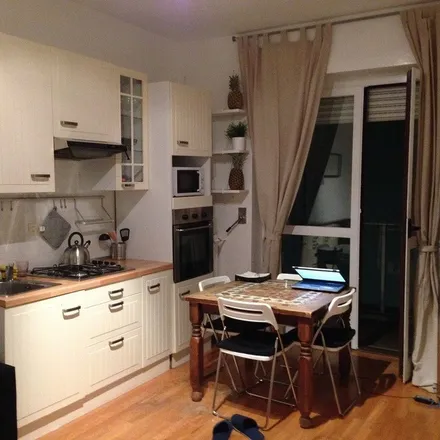 Rent this 2 bed apartment on Art Cafe in Via Andrea Solari, 19