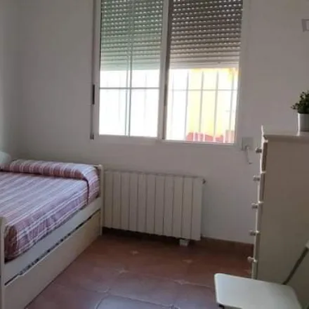 Rent this 3 bed room on Calle Jacinto Benavente in 46100 Burjassot, Spain