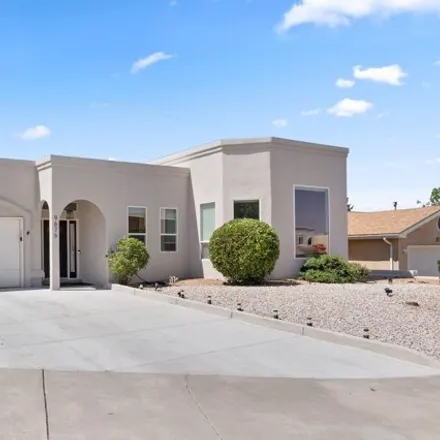 Buy this 4 bed house on 9694 Redmont Road Northeast in Albuquerque, NM 87109