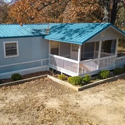 Buy this studio apartment on 3149 County Road 1411 in Log Cabin, Henderson County
