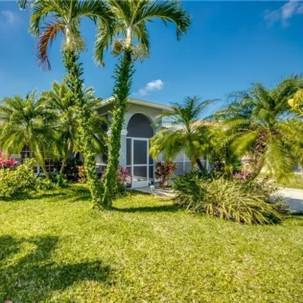 Buy this 4 bed house on 705 Southwest 35th Street in Cape Coral, FL 33914