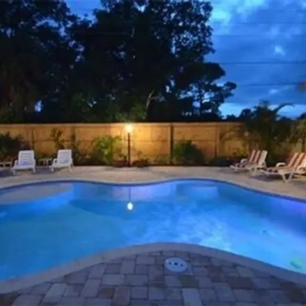 Rent this 3 bed house on 1372 Embassy Lane in East Naples, FL 34104