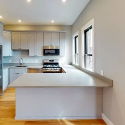 Rent this 3 bed apartment on #3,215 M Street in City Point, South Boston