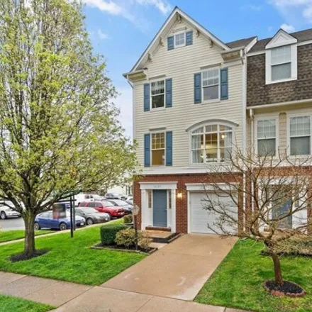 Rent this 3 bed townhouse on 8121 Rainwater Circle in Yorkshire, Prince William County