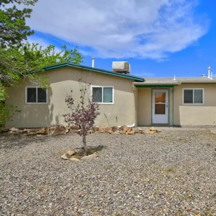 Buy this 3 bed house on 11869 Marquette Avenue Northeast in Albuquerque, NM 87123