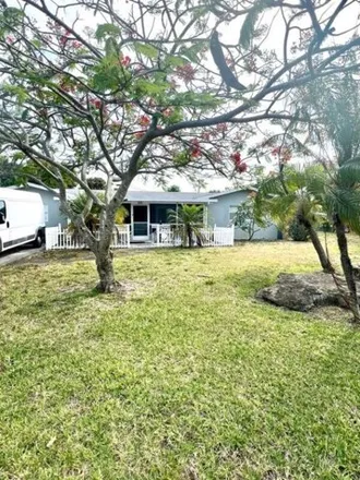 Buy this 4 bed house on 401 Crescent Drive in Lake Park, North Palm Beach
