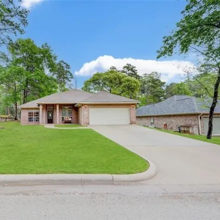 Buy this 4 bed house on 1911 Greentree Drive in Huntsville, TX 77340