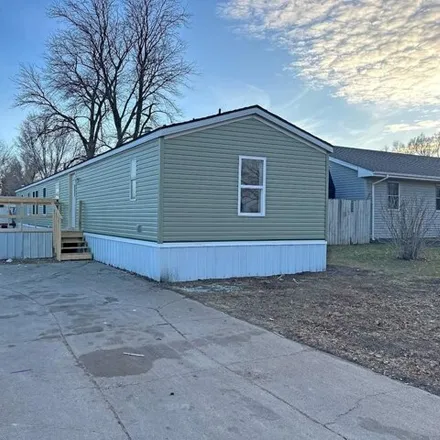 Buy this studio apartment on 1021 East 6th Street in Cozad, NE 69130
