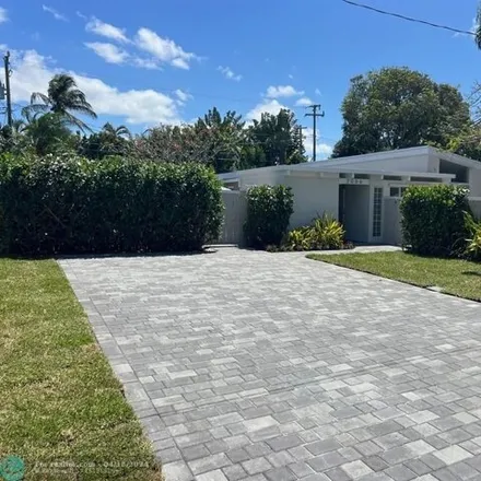 Buy this 4 bed house on 1974 Northeast 29th Court in Fort Lauderdale, FL 33306