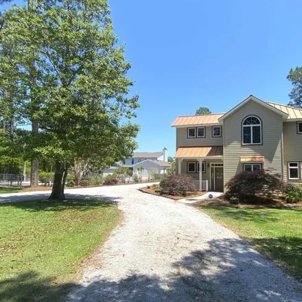 Buy this 3 bed house on 7002 South Bayou Drive in Elberta, AL 36530