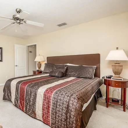 Rent this 4 bed townhouse on Estefan Kitchen Orlando in Sunset Walk at Margaritaville Resort Orlando, 3269 Margaritaville Boulevard