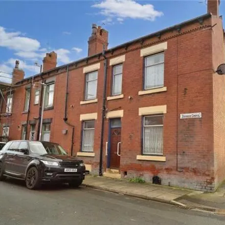 Buy this 2 bed townhouse on Dobson Grove in Leeds, LS11 5PE