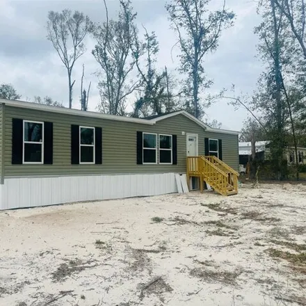 Buy this studio apartment on 22525 CR 250 in Dowling Park, Suwannee County