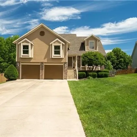 Buy this 4 bed house on 5313 Northeast Rainbow Circle in Lee's Summit, MO 64064