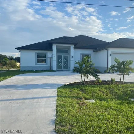 Buy this 4 bed house on 1624 Northeast 10th Lane in Cape Coral, FL 33909