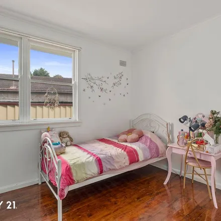 Rent this 3 bed apartment on 14 Brubri Street in Busby NSW 2168, Australia