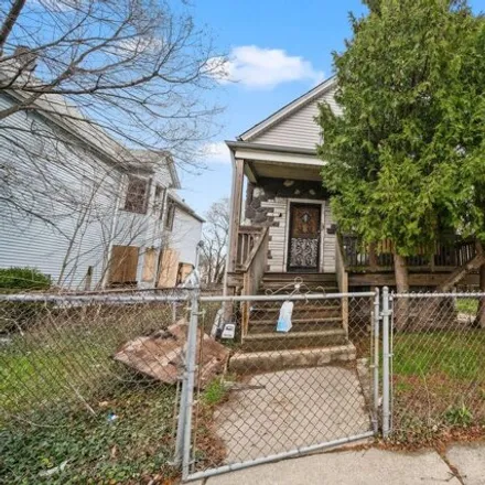 Buy this 3 bed house on 11615 South Lafayette Avenue in Chicago, IL 60628