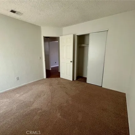 Rent this 2 bed apartment on 100 Peppertree Drive in Perris, CA 92571