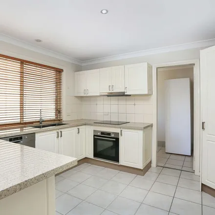 Rent this 4 bed townhouse on Eastern Road in Quakers Hill NSW 2763, Australia