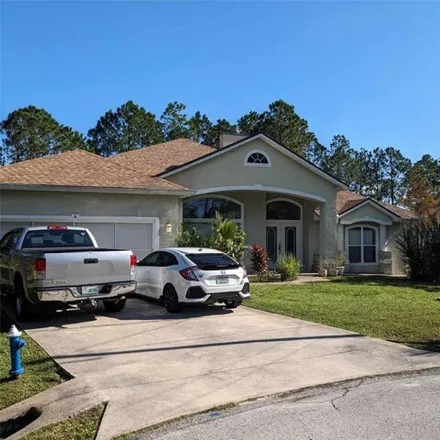 Buy this 4 bed house on 98 Leeds Place in Palm Coast, FL 32137