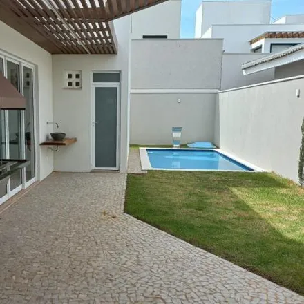 Buy this 3 bed house on Avenida Argemiro Evangelista Ferreira in Shopping Park, Uberlândia - MG