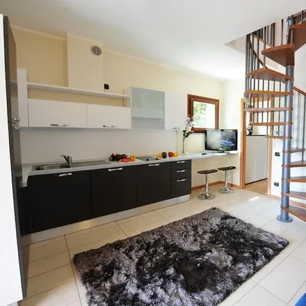 Rent this 3 bed apartment on Argegno in Strada statale 340 Regina, Argegno CO