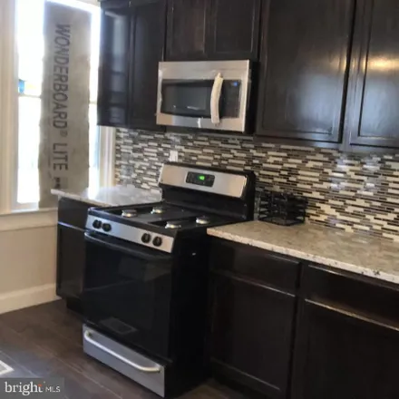 Rent this 4 bed townhouse on 764 Linnard Street in Baltimore, MD 21229