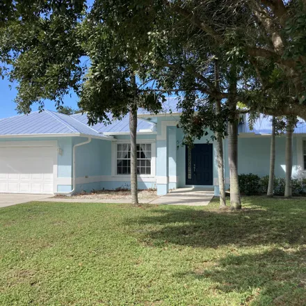 Buy this 4 bed house on 3865 Southeast Dixie Ross Street in Martin County, FL 34997