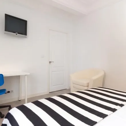 Rent this 4 bed room on Calle Camporreal in 9, 28039 Madrid