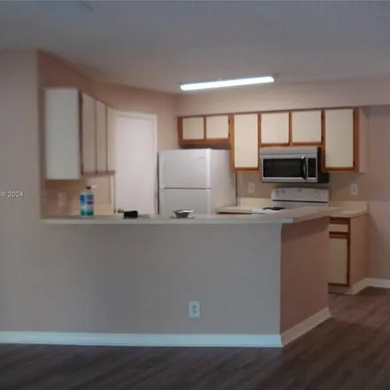 Rent this 2 bed condo on 9418 Summerbreeze Drive in Sunrise, FL 33322