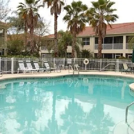 Rent this 3 bed condo on Lauque Circle in Collier County, FL 34119