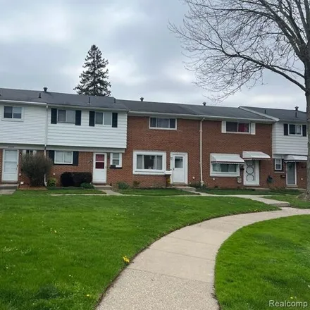 Buy this 3 bed townhouse on 20100 Merle Court in Clinton Township, MI 48035