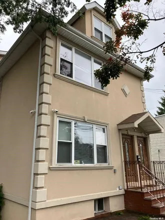 Rent this 3 bed house on 123rd Street in New York, NY 11356