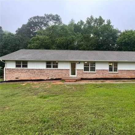 Rent this 3 bed house on 1979 North Road Southwest in Snellville, GA 30078