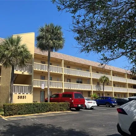 Rent this 1 bed condo on 5851 Nw 62nd Ave Apt 305 in Tamarac, Florida