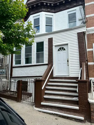 Buy this 7 bed townhouse on 1750 Anthony Avenue in New York, NY 10457