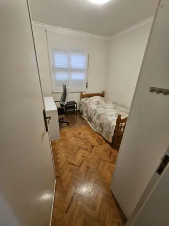 Rent this 2 bed room on Rua Cidade de Benguela LT 292 in 1800-071 Lisbon, Portugal