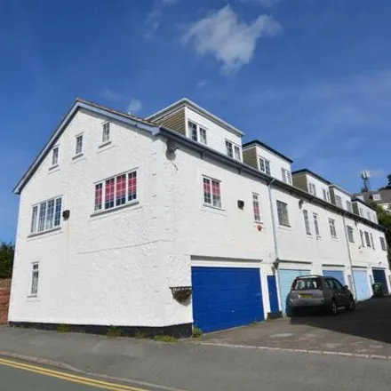 Rent this 2 bed townhouse on Castle Drive in Heswall, CH60 4RJ