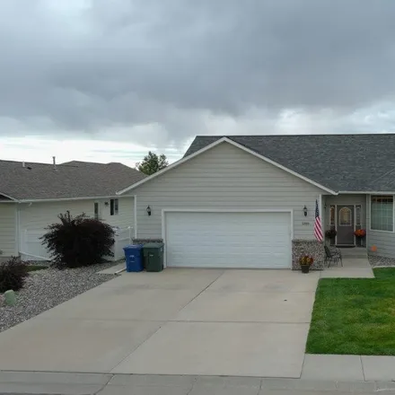 Buy this 4 bed house on 1886 Paintbrush Drive in Sheridan, WY 82801