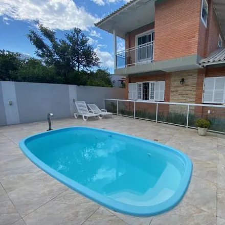 Rent this 4 bed house on Servidão Manoel Firmiano in Ponta das Canas, Florianópolis - SC