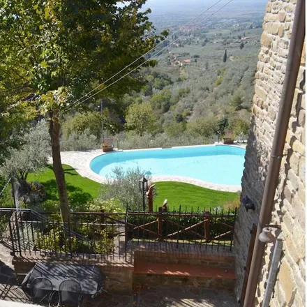 Rent this 6 bed house on Arezzo