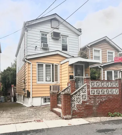 Buy this 3 bed house on 57-42 75th Street in New York, NY 11379