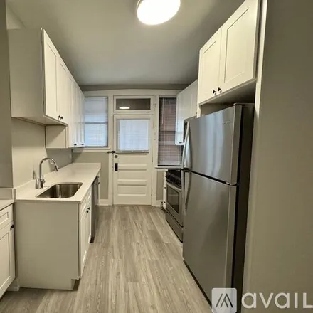 Rent this 2 bed apartment on 2607 N Kostner Ave