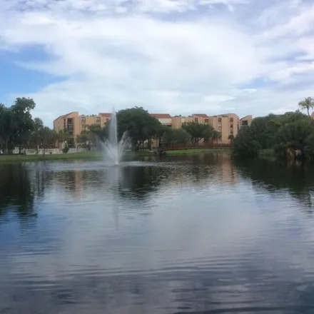 Rent this 2 bed condo on 310 Egret Circle in Delray Beach, FL 33444